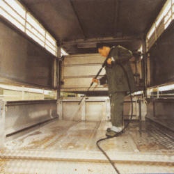 Disinfecting a pig transporter